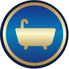 A gold bathtub icon with a faucet on a blue circular background bordered by a gold ring.
