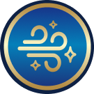 A gold stylized wind swirl with three sparkles on a blue circular background, bordered by a gold ring.