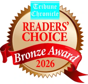 A gold and bronze badge with “Tribune Chronicle Readers’ Choice Bronze Award 2026” written on it in red and blue text.
