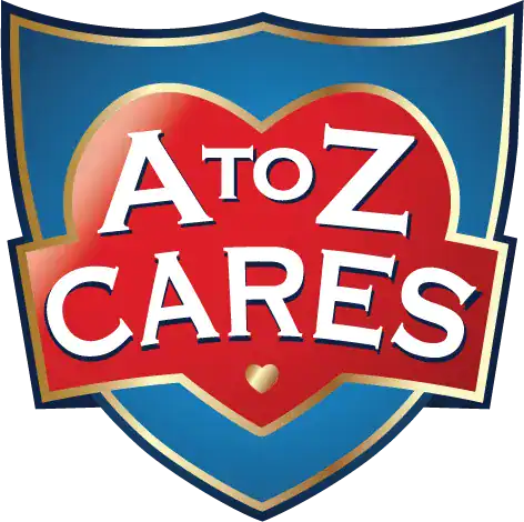 A shield-shaped logo with a red heart reads “A to Z Cares” in white letters, with a small gold heart at the bottom. Blue and gold colors frame the design.
